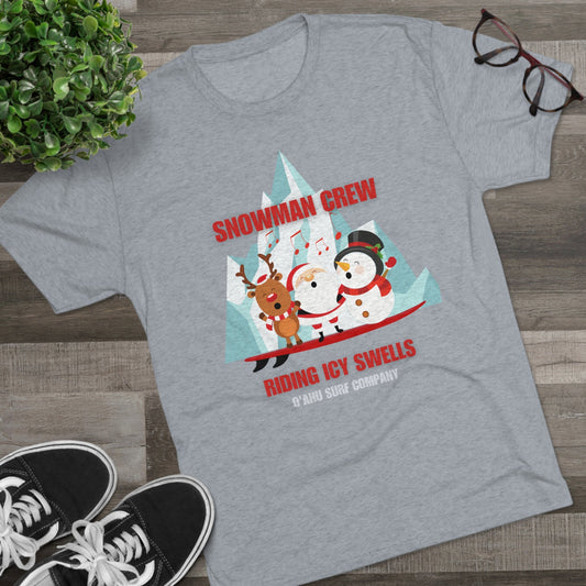 O'ahu Surf Company Snowman Crew Riding Icy Swells T-shirt. Christmas tee featuring a snowman surfing.